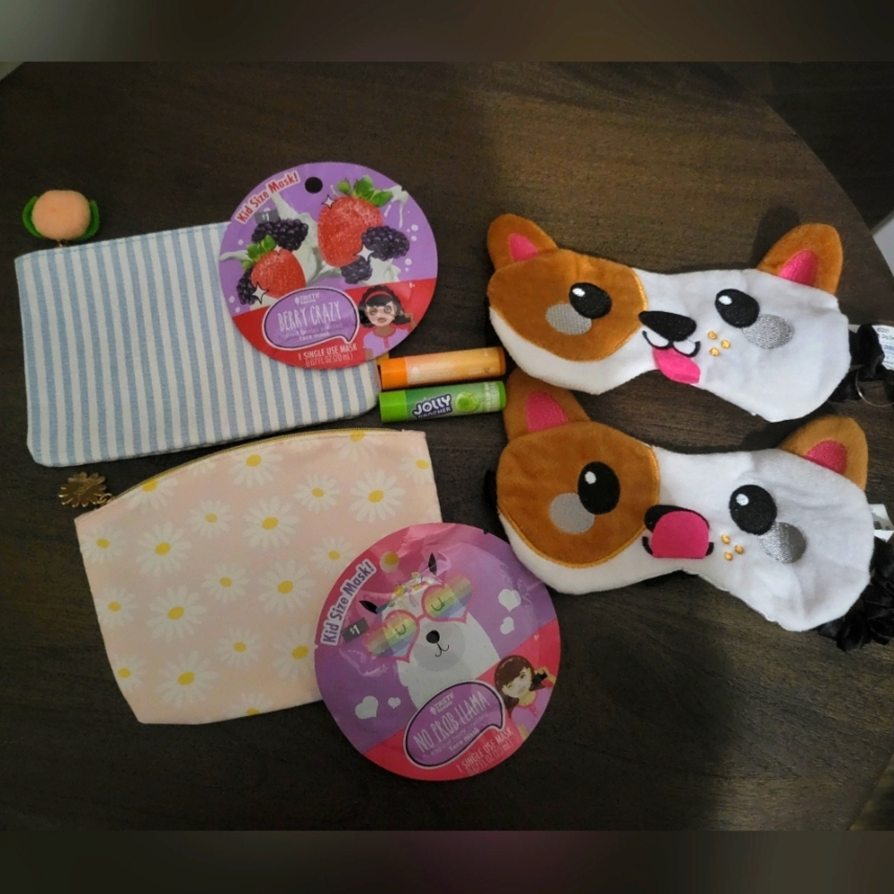 Kids bundle of 8 items-2 sleep masks, beauty pouches, chapstick, and face masks.